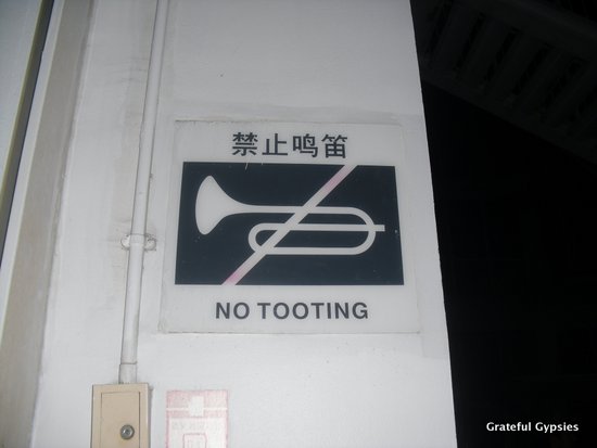 Nobody obeys the "no tooting" sign.