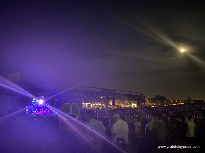 the moon over the crowd at Phish in Phoenix