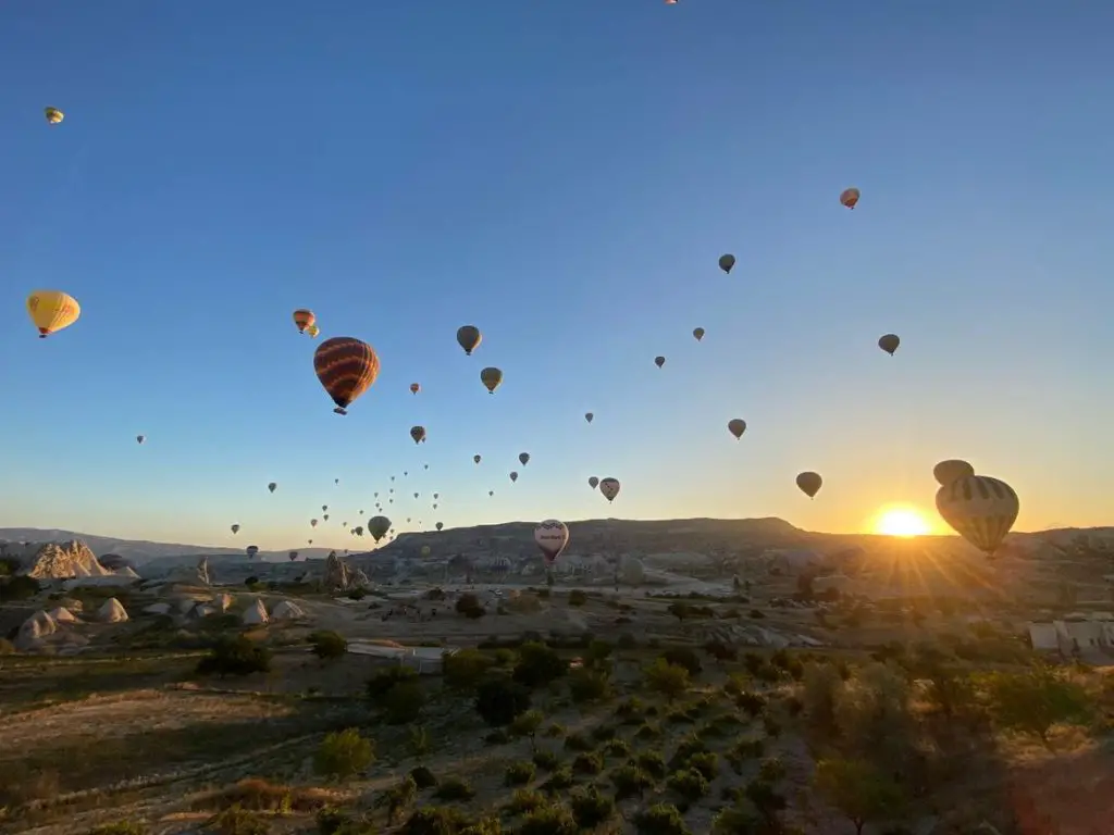 hot air balloons takeoff sunrise goreme