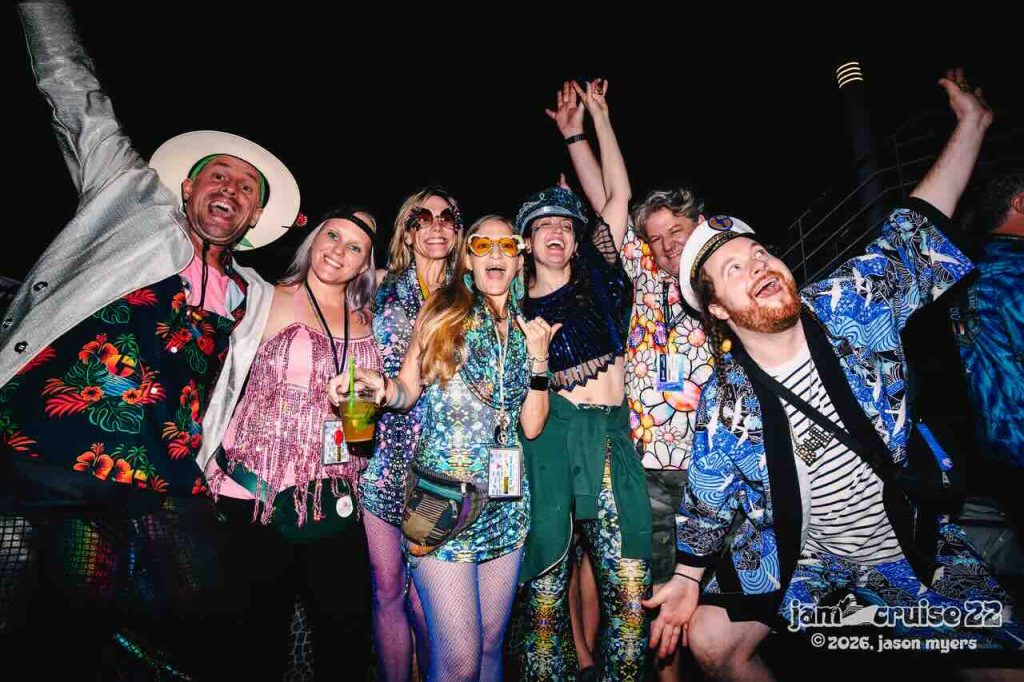 An image of a group of friends ready to party on jam cruise. photo by jason myers